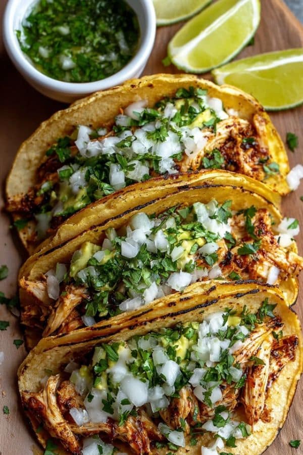 Chicken Street Tacos Recipe with avocado and cilantro on corn tortillas